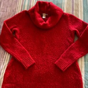 Bright red cowl neck sweater.
